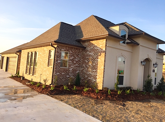 Chris' Home Improvements - Thibodaux, LA. Give us a call at (985)859-6137 for a FREE estimate on some gutters and downspouts like pictured here!