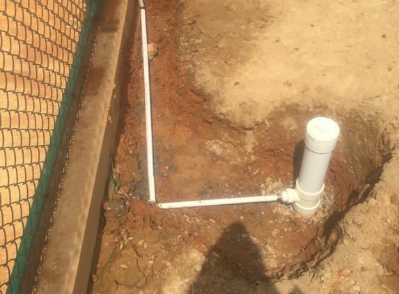 Cox Plumbing. Condensation line to underground drainage