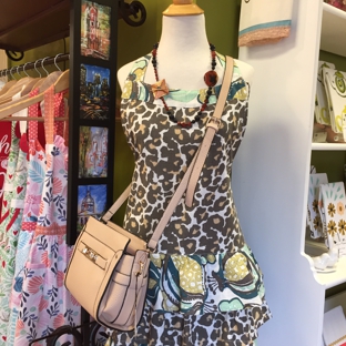 Vivid Boutique - Decatur, GA. Vintage design-inspired hostess aprons, vegan leather handbags and hand knotted jewelry by local artisans