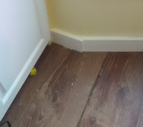 Corliss Home Repairs. Damaged Kitchen Flooring