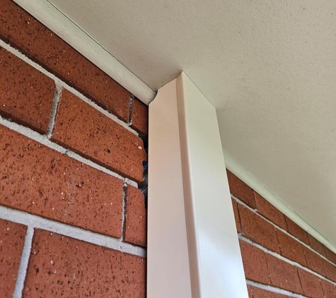 Valley Air Conditioning - Thornton, NSW. Cover channel cannot cover massive hole. not drilled with masonry hole saw. tapered cover over bent with insulation hanging out
