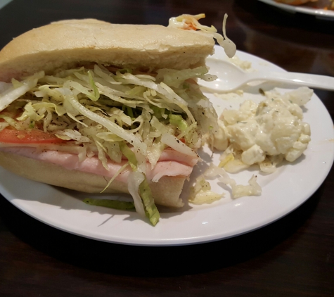 Rayhun Sandwiches & Salads - Glendale, CA. Turkey & mozzarella. All orders come with potato salad and pickle.