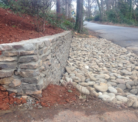 Morales Landscaping Pinestraw Services - Landscaping, Design, & Tree Service, SC. Stone retaining wall & river stone