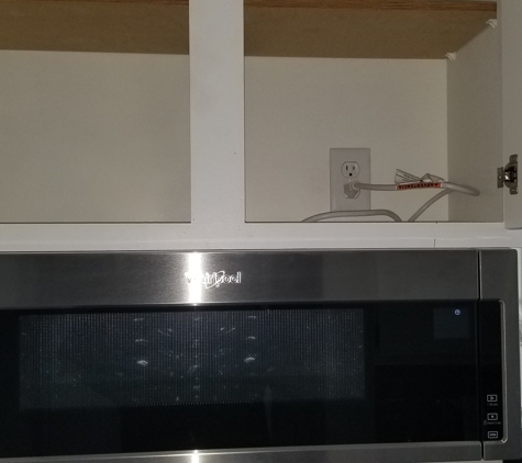 Buzz Electric - Dearborn, MI. MICROWAVE outlet in cabinet