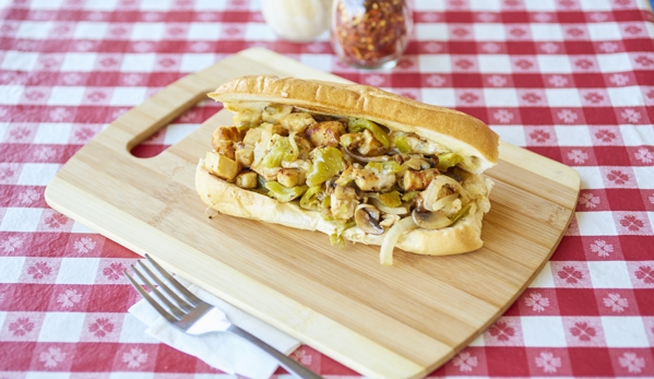 Winner's NY Pizza - Agoura Hills, CA. Chic O'Philly
(Tender chicken grilled up with mushrooms, onions, green peppers served on toasted Philly roll)