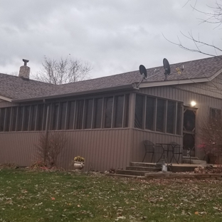 Barr Roofing & Exteriors. Front of home.

New roof, new aluminum soffit & fascia, new Board & Batten vertical siding with Cedar Shake siding, and new gutters with gutter guards.