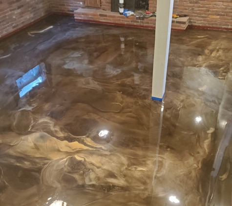 Rossi Decorative Concrete & Epoxy - Apison, TN. Metallic epoxy floor