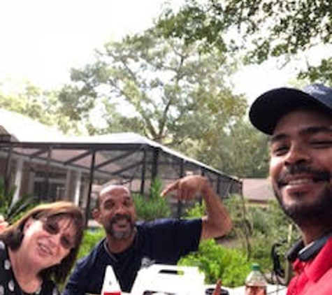 Americas Movers Inc. - Miami, FL. Our movers having lunch with Mrs. Walker during her move!