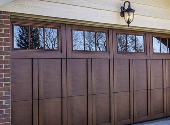 Blue Steel Garage Door Services LLC - Dade City, FL. Wood Grain style 16x7