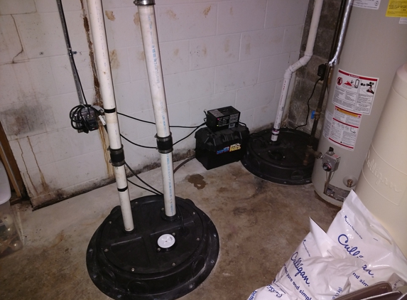 HUGHES PLUMBING - Lafayette, IN. New Radon covers with a new battery backup pump.