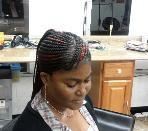 Yjire Yvette Braiding & Weaving Resolution - Saint Louis, MO. Corn Row styles yjire Yvette Hair Braiding ,  9742A Lackland Rd Overland MO 63114 