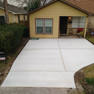 AB Concrete - Houston, TX. The homeowner was very happy about her new driveway