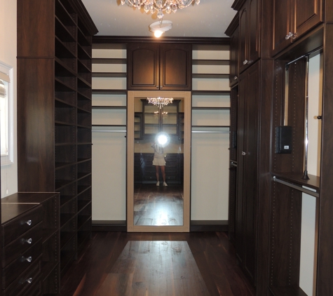 Bella Systems Philly. Closet solution for large walk in with chocolate finish.