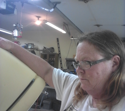 Hamm Upholstery - Ash Grove, MO. Owner/Restylist working on the Altima