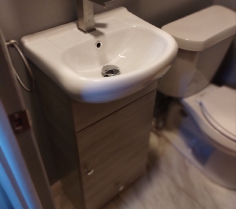 Laings Painting And Carpentry - Rochester, NY. We installed the new vanity, Floor, And toilet