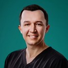 Tyler A. Evans, MD, FACS