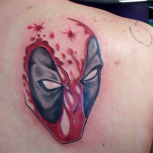 Iron Raven Tattoo Company - Palmetto, FL. Deadpool tattoo by Manny Lopez!