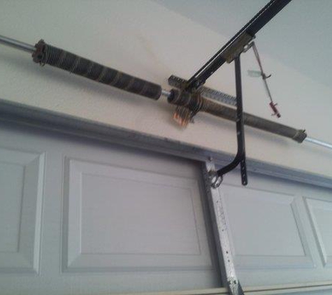 Clarks Garage Door Repair - Los Angeles, CA. He fixed my springs (shown here in photo)