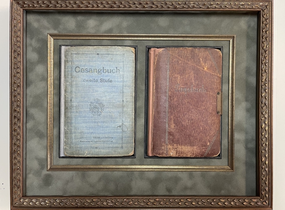 Artistic Expressions Custom Picture Framing - Winter Park, FL. museum display of antique journals.