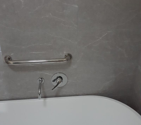 Brett Hoban Plumbing Pty Ltd - Swansea, NSW. rail & bath fittings