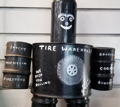 Tire Warehouse - Greenfield, MA. Cute little Mascot guy