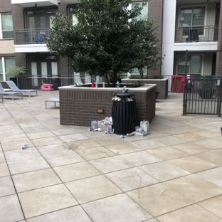 L2 Uptown Apartments - Dallas, TX. Garbage at pool at L2 Uptown Luxury Apartments