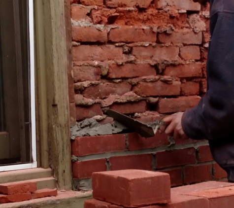 City Brick Restorations - Lancaster, PA. Laying new brick to prevent moisture penetrating through this exterior wall.