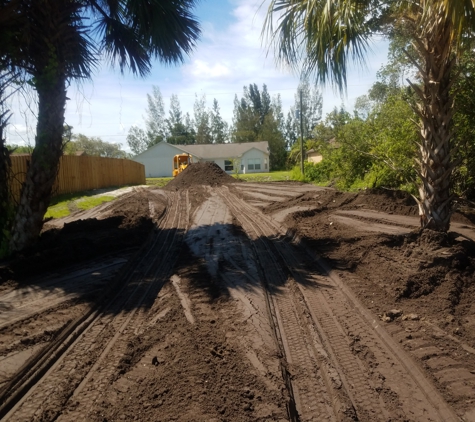 AAA Excavating Svcs., LLC - Cocoa, FL. Filling lot to grade