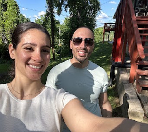 Cash Out On My Home - Chattanooga, TN. Mallie Messri and Jonathan Messri, Owners of Cash Out On My Home Seen in Front of an Apartment Building Purchased in Eastridge, TN