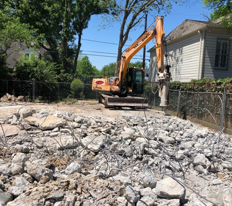 National Demolition. 40” concrete slab. Hammer time