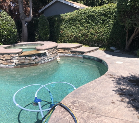 Mikey's Pool Tile Cleaning and Handyman Services LLC - Madera, CA. Before right and left After in the middle