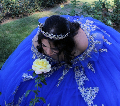 Joseph Zahnle Photography - Caldwell, ID. Quince smelling the rose