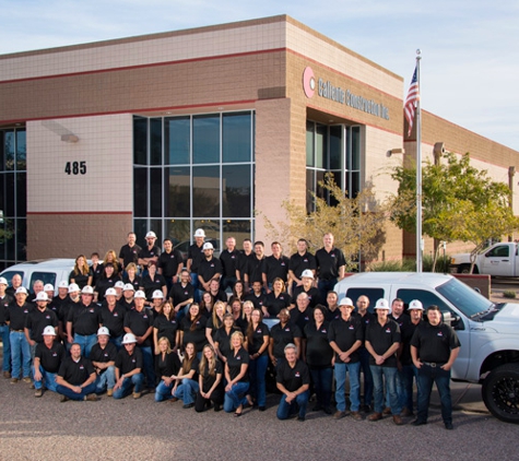 Caliente Construction Inc - Tempe, AZ. Caliente Construction team in front of the Tempe headquarters