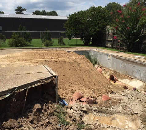 Excavation Solutions LLC - Zachary, LA. Filling in a swimming pool.