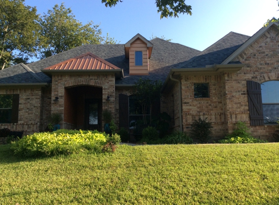 American Heritage TX Roofing & Construction LLC - Weatherford, TX. We replaced roof with new gray shingles with a copper color metal accent on the hip and dormer, turned out great!