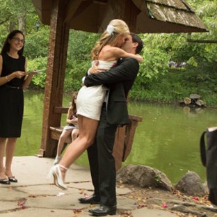 Officant NYC - New York, NY. Central Park wedding hug