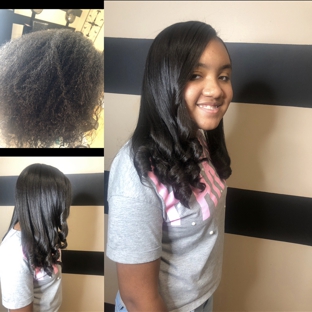 Jazze Hair Salon - Duncanville, TX. Natural hair  straighten with flat iron silky straight with curls