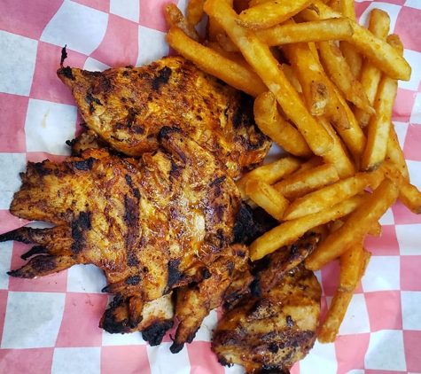 zezo sub & grill - Detroit, MI. whole grilled chicken