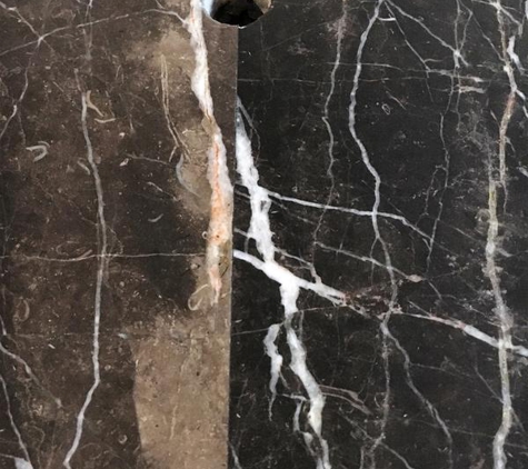 Gitani Stone Pty Ltd - Seven Hills, NSW. marble not matched (located in centre of kitchen island).