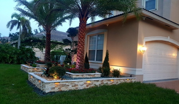 Top Green Landscaping - Pembroke Pines, FL. Top green veneer Stone boulders