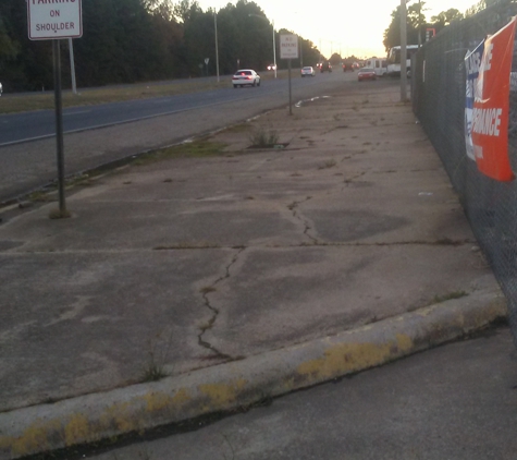 Wolf's Towing - Shreveport, LA. The red car