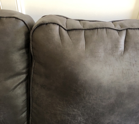 Gallery Furniture - Houston, TX. My couch has a pimple. ����