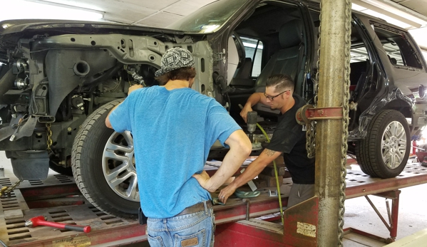 Railyard Customs & Collision - Palestine, TX. Straightening the frame after being hit by a semi truck!