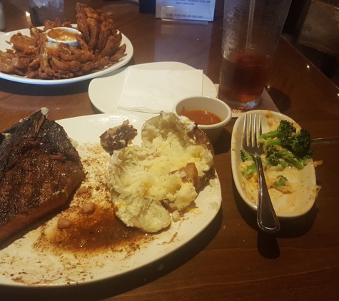 Outback Steakhouse - Lafayette, LA. I tried! 22oz bone in Ribeye.