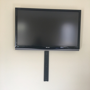 Pro TV Wall Mount Installation - Hollywood, CA. Our lovely tv mounted on the wall perfectly.