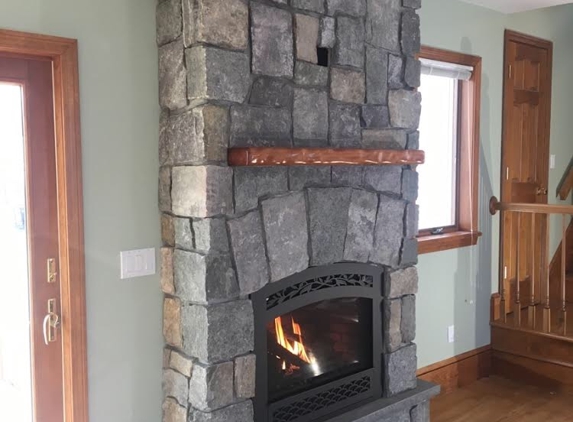 Savvy Custom Builders - Warrensburg, NY. adirondack stone squares and rectangles fireplace