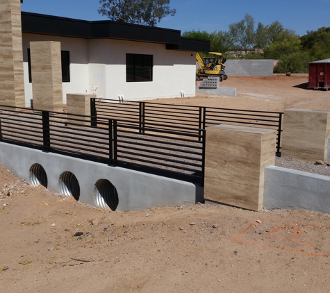 Building Block Masonry - Phoenix, AZ. Custom metal guard rails above bridge