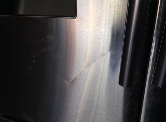 All American Pro Moving - Aurora, CO. Scratches in our stainless fridge