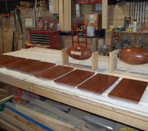 Freeman Wood Crafters - Stoneville, NC. Hand turned  footballs for trophys for school system in SD.