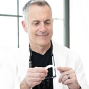 August de Oliveira DDS - Dentists